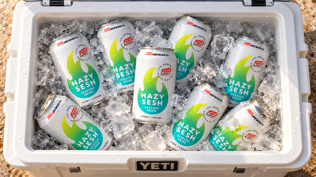 Overhead view of Fuel Hazy Sesh cans nestled in ice inside a white Yeti esky.